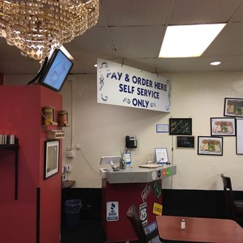 Raavi - inside.  self service - pay and order here - Indian Near Me - San Francisco, California