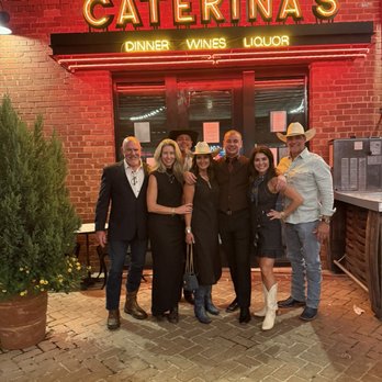 Caterina's - With Milos in front of the restaurant after a magical night. - Wine Bars Near Me - Fort Worth, Texas Caterina's - With Milos in front of the restaurant after a magical night. - Wine Bars Near Me - Fort Worth, Texas