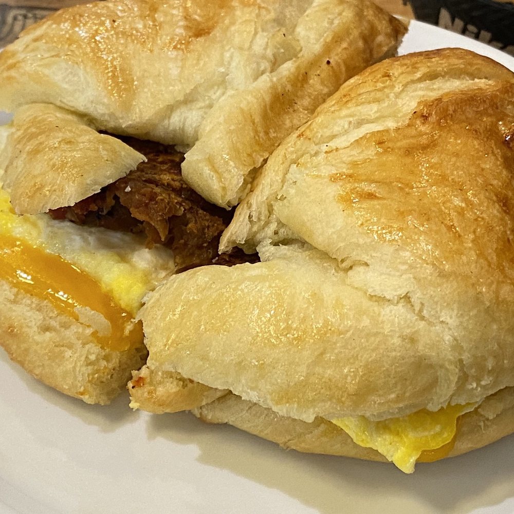 Sentient Bean - Egg and cheese croissant with vegan sausage - Coffee & Tea Near Me - Savannah, Georgia