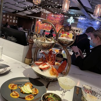 Gordon Ramsay Hell's Kitchen - Seafood tower, Brussels sprouts  and scallops! Grab the desolation! Best drink I've ever had. - Steakhouses Near Me - Stateline, Nevada