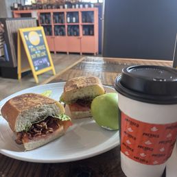 goat cheese and bacon panini. The goat cheese and balsamic vinaigrette with crunch with the bacon! Drink: a white chocolate hot latte