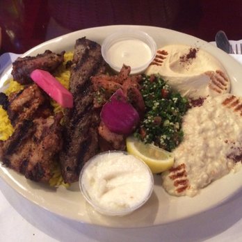 Olivit Mediterranean Grill - Beef kabob, beef skewer, chicken on rice with tabouli hummus n baba G. It's called the "olivit platter" - Mediterranean Near Me - Spring, Texas Olivit Mediterranean Grill - Beef kabob, beef skewer, chicken on rice with tabouli hummus n baba G. It's called the "olivit platter" - Mediterranean Near Me - Spring, Texas