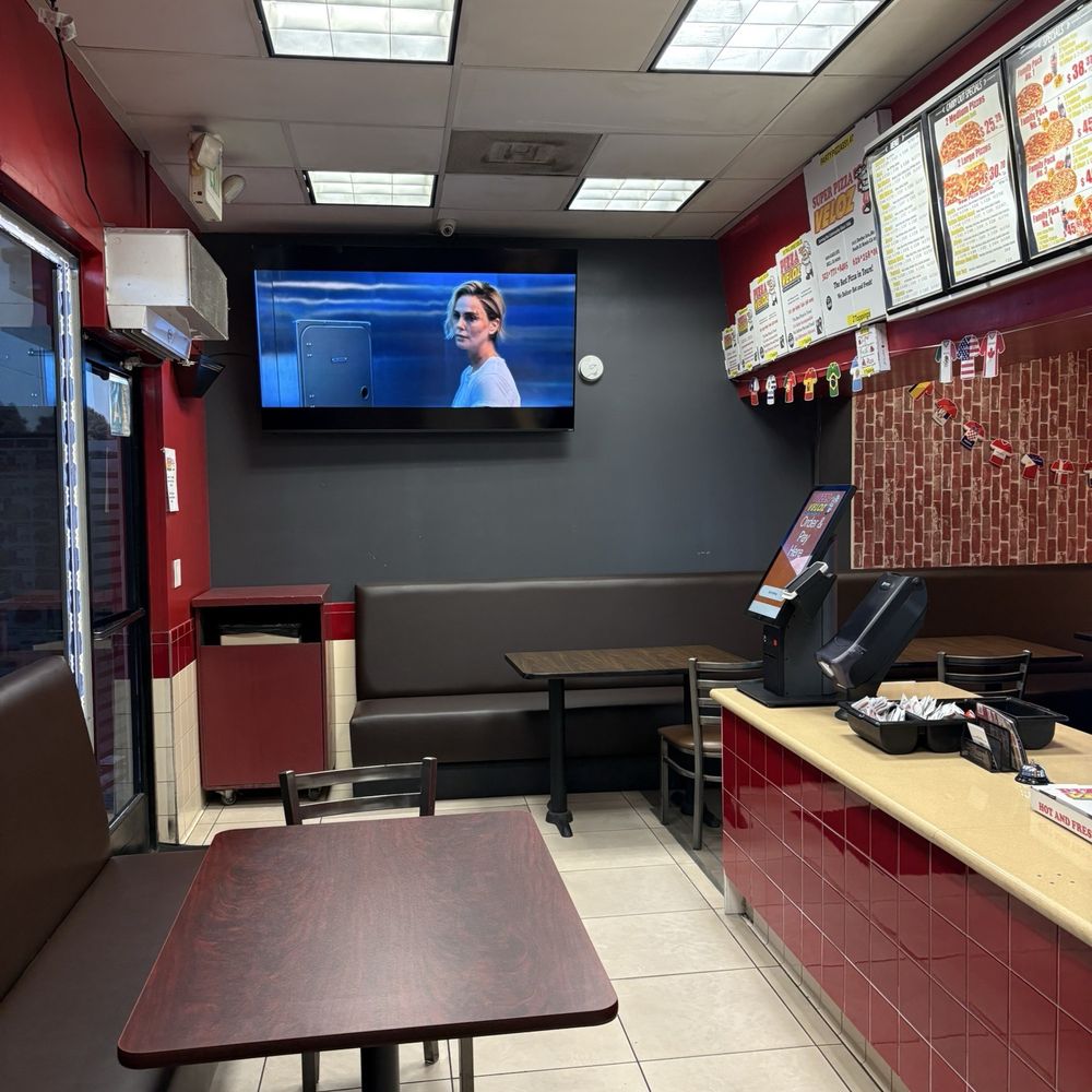 Super Pizza Veloz - View from one side of the wall to the entrance - Pizza Near Me - South El Monte, California Super Pizza Veloz - View from one side of the wall to the entrance - Pizza Near Me - South El Monte, California