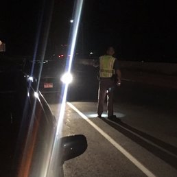 Sheriff shows up to help direct traffic away from my truck. I could barely pull it over on the shoulder on a narrow mountain road. Sheriff shows up to help direct traffic away from my truck. I could barely pull it over on the shoulder on a narrow mountain road.