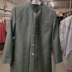 Golden Touch Cleaners - Alteration- shoulder and sleeve take-in
