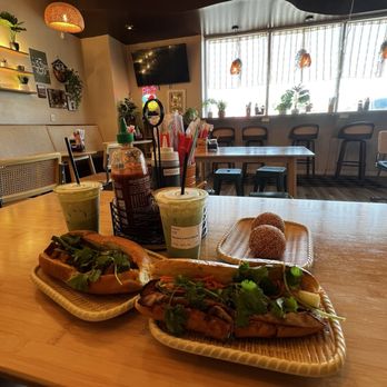 Dalat's Cafe - Lemongrass tofu banh mi and banh mi dac biet with two banh cam - Vietnamese Near Me - Louisville, Kentucky Dalat's Cafe - Lemongrass tofu banh mi and banh mi dac biet with two banh cam - Vietnamese Near Me - Louisville, Kentucky
