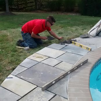 Rodriguez Landscaping Services - A flagstone patio was installed around the pool. - Landscaping Near Me - Chantilly, Virginia