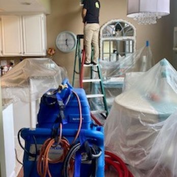 Breathable - Vent cleaning in progress. Note all the plastic covering. - Heating & Air Conditioning/HVAC Near Me