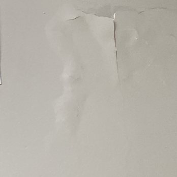 Brink Roofing - bubble in wall from water damage from leak - Roofing Near Me - Erie, Pennsylvania