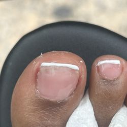 G T Nails - Look at how she didn't even put the base polish all over my toe!
