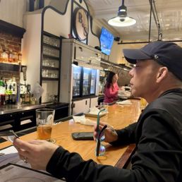 We sat at the bar We sat at the bar