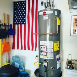 American Plumbing and Rooter - American Plumbing And Rooter fresh hot water heater  install with our customers American flag in perfect view!