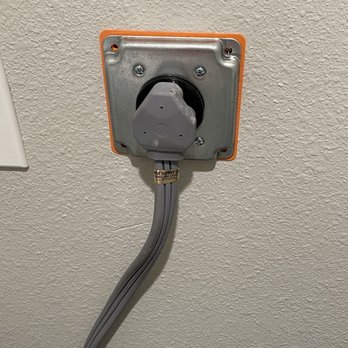 K & E Home Solutions - Finished 220V outlet in the laundry room - Electricians Near Me
