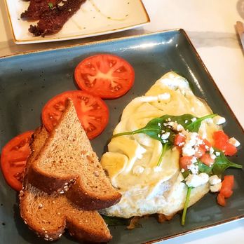 First Watch - Healthy Turkey (Onions, tomatoes, spinach, feta cheese, with cage-free egg white omelet. With tomatoes and whole grain artisan toast). - Breakfast & Brunch Near Me - Paramus, New Jersey