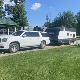 White SUV with power to pull a trailer White SUV with power to pull a trailer