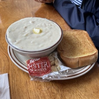 Chowder Bowl - A bowl of clam chowder with a slice of garlic bread - Seafood Near Me - Newport, Oregon