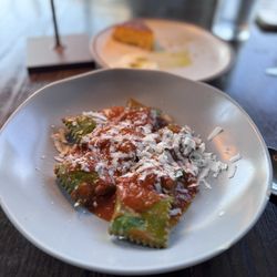 Catherine and Mary's - SPINACH AGNOLOTTI beef genovese, pomodoro sugo, ricotta salata