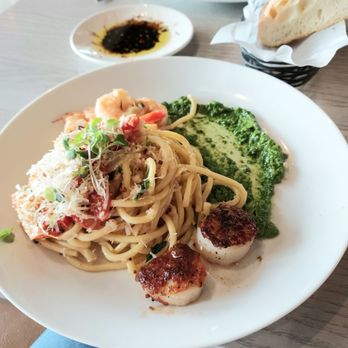 The Cove - Seafood bucatini with focaccio bread and dip in the background - Seafood Near Me - Vancouver, Washington The Cove - Seafood bucatini with focaccio bread and dip in the background - Seafood Near Me - Vancouver, Washington