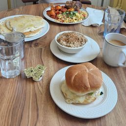 [Clockwise] Special scramble, coffee, sarah's sandwich, banana pancakes, oatmeal