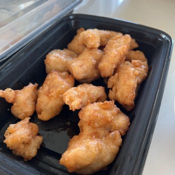 Happy Buddha - Sweet and sour chicken (sorry... I didn't take a "before" pic. Sauce was on the side - Chinese Near Me - Galveston, Texas Happy Buddha - Sweet and sour chicken (sorry... I didn't take a "before" pic. Sauce was on the side - Chinese Near Me - Galveston, Texas