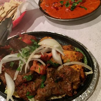 India's Restaurant - The mixed tandoor grill, butter chicken, and wheat roti naan. - Indian Near Me - Baton Rouge, Louisiana India's Restaurant - The mixed tandoor grill, butter chicken, and wheat roti naan. - Indian Near Me - Baton Rouge, Louisiana