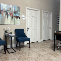 Mindful Massage - Settle in and unwind. The waiting area is quiet, comfortable, and designed to help you shift into relaxation before your session begins.