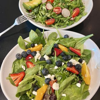 Cork & Cleaver - Citrus berry salad (front), avocado kale salad (back) - Gastropubs Near Me - Montgomery, Alabama