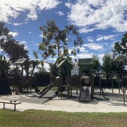 Neff Park - Playground with sand and rubber, multiple slides and swings.