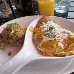 Omelette with a side of hash brown casserole Omelette with a side of hash brown casserole