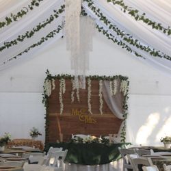 Los Hermanos Party Rental - carp decorated with tables and chairs. everything was provided by them.