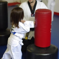 LightSpeed Martial Arts Academy - Little Dragon working with Master Salisbury on counting while punching and fitness!