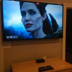 Oliver Home Technologies - Wires wallfished and tv mounted. Same day service!