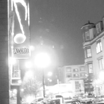 California Jazz Conservatory - a man sitting on a bench under a street light - Jazz & Blues Near Me - Berkeley, California California Jazz Conservatory - a man sitting on a bench under a street light - Jazz & Blues Near Me - Berkeley, California