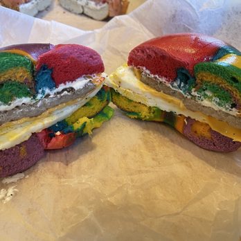 Bagel Cafe 21 - Rainbow bagel with cream cheese, cheese, sausage, and egg - Bagels Near Me - Richardson, Texas Bagel Cafe 21 - Rainbow bagel with cream cheese, cheese, sausage, and egg - Bagels Near Me - Richardson, Texas