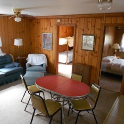 The Retreat at Lost Land Lake - Each cabin has a living room, bedroom(s), bathroom and kitchen.
