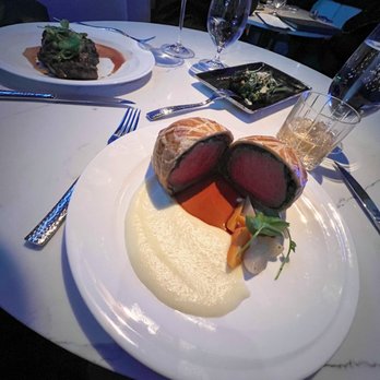 Ramsay's Kitchen - Beef Wellington (NY Strip on left, broccolini in front) - American Near Me - Boston, Massachusetts Ramsay's Kitchen - Beef Wellington (NY Strip on left, broccolini in front) - American Near Me - Boston, Massachusetts