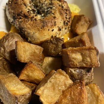 WoodGrain Bagels & Deli - Breakfast sandwich - was surprised it came with potatoes - Bagels Near Me - Boulder, Colorado WoodGrain Bagels & Deli - Breakfast sandwich - was surprised it came with potatoes - Bagels Near Me - Boulder, Colorado