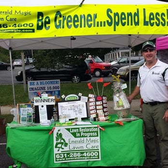 Emerald Magic Lawn Care - a man standing under a tent - Landscaping Near Me - Holtsville, New York Emerald Magic Lawn Care - a man standing under a tent - Landscaping Near Me - Holtsville, New York