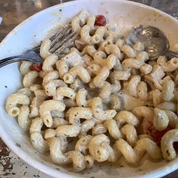 The Open Door - This is The Open Door's $25 pasta dish [with a ] "white wine blue cheese sauce, chicken, fresh cherry tomatoes and chopped basil." - New American Near Me - Sisters, Oregon