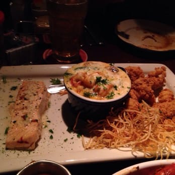 Pappadeaux Seafood Kitchen - The sampler with salmon, fondue, and deep fried alligator meat - Seafood Near Me - Arlington, Texas Pappadeaux Seafood Kitchen - The sampler with salmon, fondue, and deep fried alligator meat - Seafood Near Me - Arlington, Texas
