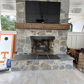 Jordans Construction - a stone fireplace with a flat screen tv - Masonry/Concrete Near Me - Charlotte, North Carolina Jordans Construction - a stone fireplace with a flat screen tv - Masonry/Concrete Near Me - Charlotte, North Carolina