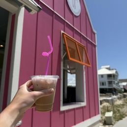 Iced latte with pink cold foam Iced latte with pink cold foam