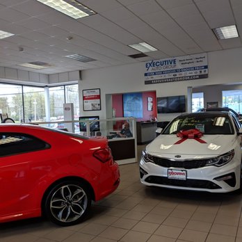 Executive Kia - Waiting area is beyond the cars there - Car Dealers Near Me - Wallingford, Connecticut Executive Kia - Waiting area is beyond the cars there - Car Dealers Near Me - Wallingford, Connecticut
