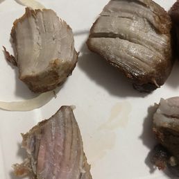 Grey pork chunks, foul smell and disgusting. Grey pork chunks, foul smell and disgusting.