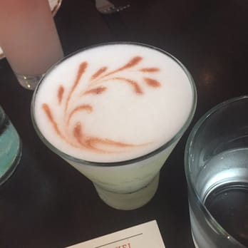 Tanta - Pisco sour with a liquid cinnamon topping. First time trying pisco and it was excellent! - Peruvian Near Me - Chicago, Illinois
