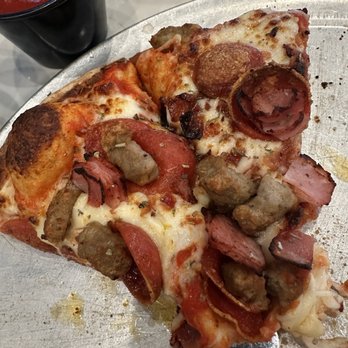 The Brass Tap - Meat lovers pizza - Sports Bars Near Me - Hollister, California