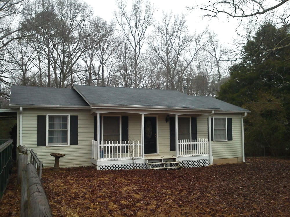 Slide of Thaxton Roofing