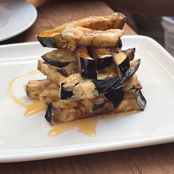 Azabache - Grilled eggplant with honey drizzle. - Tapas Bars Near Me - Seville, SE Azabache - Grilled eggplant with honey drizzle. - Tapas Bars Near Me - Seville, SE