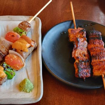 Yakitori Hachibei - Wagyu A5 with vegetables (uni on skewer in foreground) and unagi grilled on right - Japanese Near Me - Honolulu, Hawaii