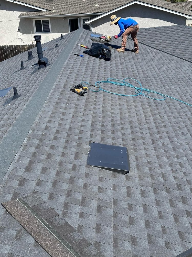 Slide of Tecun’s Roofing